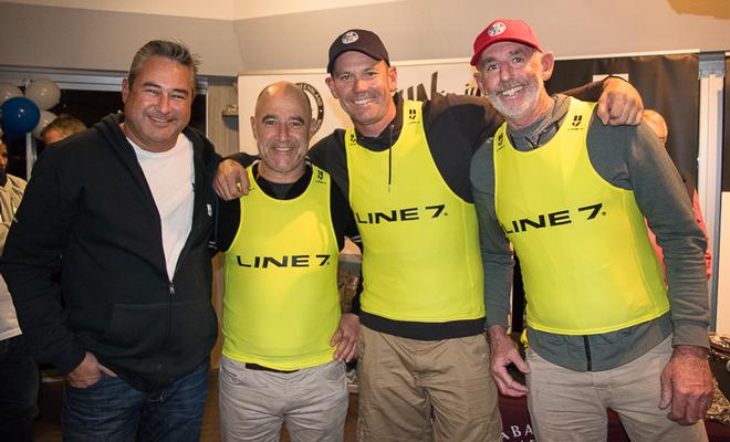 Line 7’s Duncan Curnow presents the Yellow Jerseys to James Mayo, Graeme Taylor and Steve Jarvin – team Magpie. - 2017 Etchells Australasian Championship ©  Alex McKinnon Photography http://www.alexmckinnonphotography.com